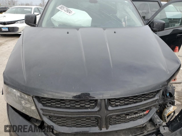2019 Dodge Journey SE z VIN 3C4PDCBB1KT719203, wystawiony jako Copart lot #86170744 z przebiegiem Nie podano mil oraz Szkoda całkowita • Salvage title. Historia ofert i sprzedaży dostępna na DreamBid. Obrazek 12.