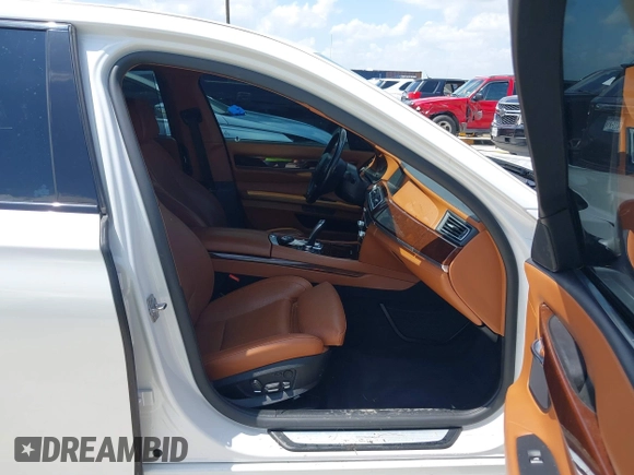 2012 BMW 7 Series 750Li with VIN WBAKB8C54CC964576, listed as a IAAI auction lot 42499443 with 78,728 mi miles and . Bid and sale history available at DreamBid. Image 5.
