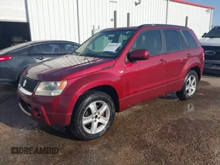 2007 Suzuki Grand Vitara Luxury z VIN JS3TE947474200491, wystawiony jako IAAI lot #42462678 z przebiegiem 230 007 mil mil oraz . Historia ofert i sprzedaży dostępna na DreamBid. Obrazek 2.