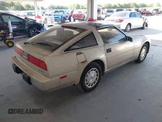 1987 Nissan 300ZX with VIN JN1HZ14S1HX220165, listed as a IAAI auction lot 42513578 with 226,712 mi miles and . Bid and sale history available at DreamBid. Image 4.