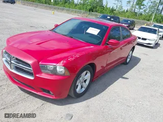 2012 Dodge Charger SXT with VIN 2C3CDXHG7CH267734, listed as a IAAI auction lot 41449921 with 170,724 mi miles. Bid and sale history available at carsss.com. Image 2.