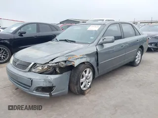 2002 Toyota Avalon XL with VIN 4T1BF28BX2U262186, listed as a IAAI auction lot 41572610 with 164,899 mi miles and . Bid and sale history available at DreamBid. Image 23.