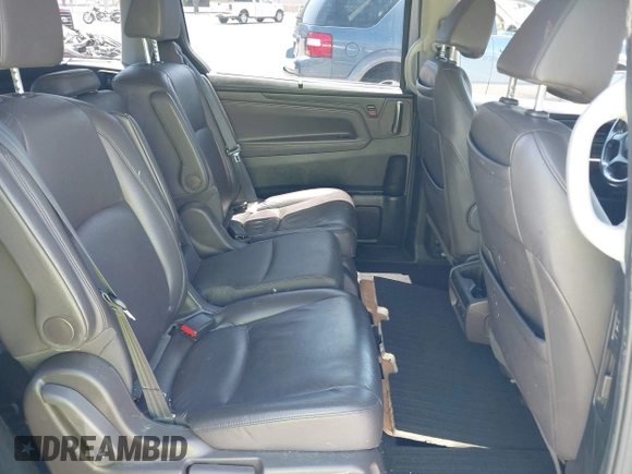 2018 Honda Odyssey Touring with VIN 5FNRL6H81JB022975, listed as a IAAI auction lot 42653304 with 210,137 mi miles and . Bid and sale history available at DreamBid. Image 8.