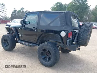 2010 Jeep Wrangler Sport with VIN 1J4AA2D15AL161650, listed as a IAAI auction lot 41805852 with 89,952 mi miles and . Bid and sale history available at carsss.com. Image 3.