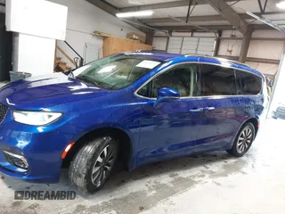 2021 Chrysler Pacifica Touring L z VIN 2C4RC1BGXMR503108, wystawiony jako IAAI lot #41914136 z przebiegiem 98 685 mil mil oraz . Historia ofert i sprzedaży dostępna na DreamBid. Obrazek 14.