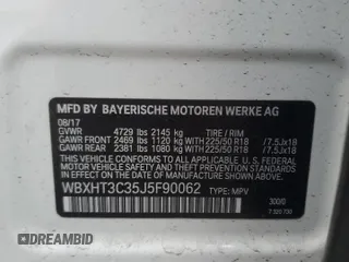 2018 BMW X1 xDrive28i with VIN WBXHT3C35J5F90062, listed as a Copart auction lot 56284945 with 138,137 mi miles and Salvage title. Bid and sale history available at DreamBid. Image 13.
