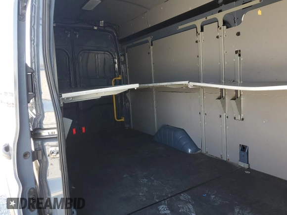 2020 Ford Transit Cargo with VIN 1FTBR3X8XLKA72246, listed as a Copart auction lot 57000035 with 65,458 mi miles and Salvage Title. Bid and sale history available at DreamBid. Image 11.