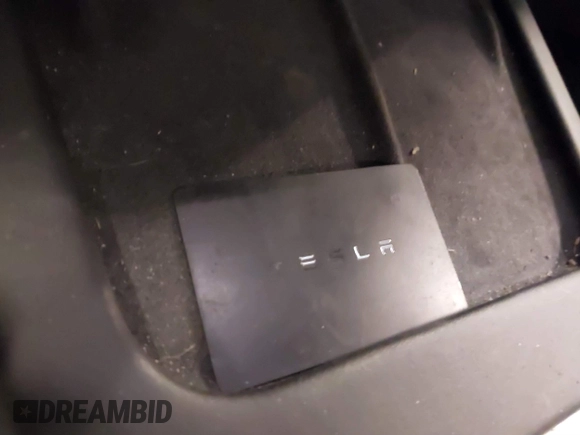 2022 Tesla Model 3 with VIN 5YJ3E1EA4NF187113, listed as a IAAI auction lot 41712331 with 81,879 mi miles and . Bid and sale history available at DreamBid. Image 11.