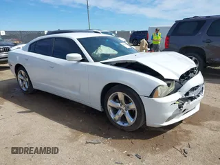 2014 Dodge Charger SE with VIN 2C3CDXBG7EH130112, listed as a IAAI auction lot 41670160 with 216,373 mi miles. Bid and sale history available at carsss.com. Image 1.
