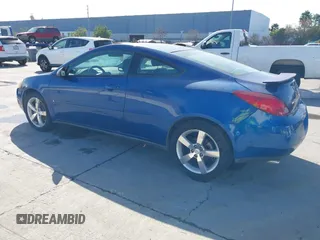 2006 Pontiac G6 GTP with VIN 1G2ZM171164167148, listed as a IAAI auction lot 41597445 with 117,227 mi miles. Bid and sale history available at carsss.com. Image 3.