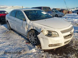2012 Chevrolet Malibu LTZ with VIN 1G1ZG5E73CF270839, listed as a IAAI auction lot 41284490 with 133,423 mi miles and . Bid and sale history available at DreamBid. Image 6.