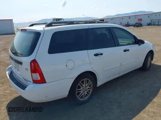 2003 Ford Focus SE Fleet z VIN 1FAFP36393W343129, wystawiony jako IAAI lot #42440063 z przebiegiem 184 413 mil mil oraz . Historia ofert i sprzedaży dostępna na DreamBid. Obrazek 4.