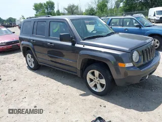 2014 Jeep Patriot Latitude z VIN 1C4NJRFB7ED892473, wystawiony jako IAAI lot #42632140 z przebiegiem 169 193 mil mil oraz . Historia ofert i sprzedaży dostępna na DreamBid. Obrazek 1.