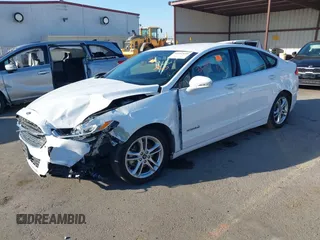 2015 Ford Fusion SE Hybrid with VIN 3FA6P0LU3FR249444, listed as a IAAI auction lot 41602659 with 145,024 mi miles. Bid and sale history available at carsss.com. Image 17.
