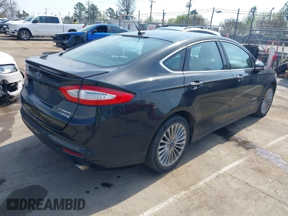 2013 Ford Fusion Titanium Hybrid with VIN 3FA6P0RU7DR355481, listed as a IAAI auction lot 41814003 with 177,789 mi miles. Bid and sale history available at carsss.com. Image 4.