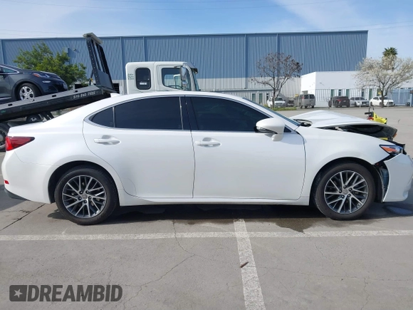 2016 Lexus ES with VIN JTHBK1GGXG2243002, listed as a IAAI auction lot 41840675 with 79,544 mi miles. Bid and sale history available at carsss.com. Image 14.