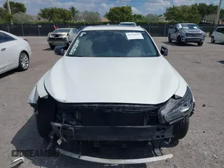 2014 Infiniti Q50 with VIN JN1BV7AP2EM671929, listed as a IAAI auction lot 41794659 with 77,930 mi miles. Bid and sale history available at carsss.com. Image 13.