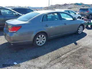 2006 Toyota Avalon XL with VIN 4T1BK36B66U152021, listed as a IAAI auction lot 41908367 with 176,467 mi miles. Bid and sale history available at carsss.com. Image 4.