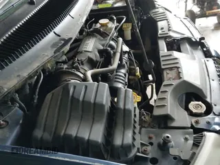 2002 Dodge Caravan ES with VIN 2B4GP54L72R581126, listed as a IAAI auction lot 42317138 with Not provided miles and . Bid and sale history available at DreamBid. Image 12.