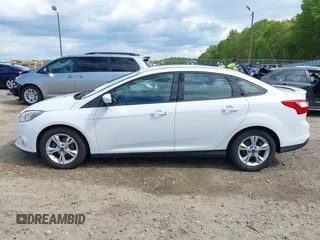 2012 Ford Focus SE with VIN 1FAHP3F2XCL122141, listed as a IAAI auction lot 42008877 with 122,743 mi miles. Bid and sale history available at carsss.com. Image 14.