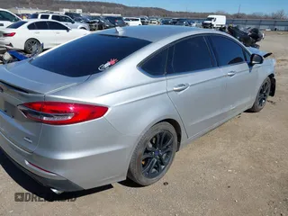 2019 Ford Fusion SE with VIN 3FA6P0HD9KR172372, listed as a IAAI auction lot 41705985 with 145,893 mi miles. Bid and sale history available at carsss.com. Image 4.