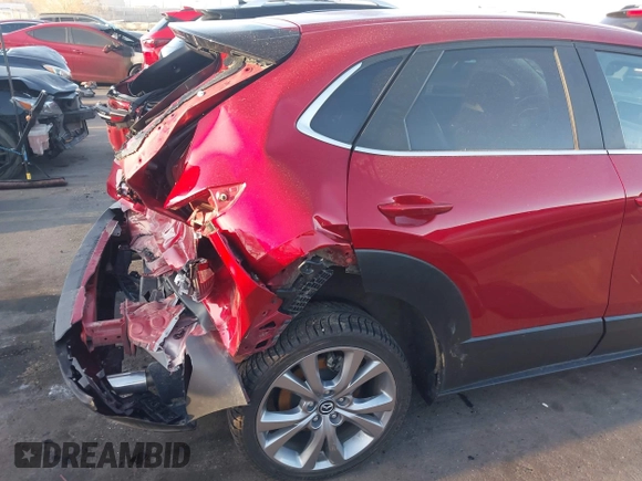 2022 Mazda CX-30 S Carbon Edition с VIN 3MVDMBCL4NM431242, выставлен на аукционе IAAI как лот 41851636 с пробегом 40 982 миль миль и . История ставок и продаж доступна на DreamBid. Изображение 6.