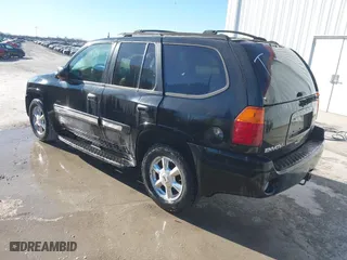 2005 GMC Envoy SLE with VIN 1GKDT13S952288760, listed as a IAAI auction lot 41671656 with 1 mi miles. Bid and sale history available at carsss.com. Image 3.