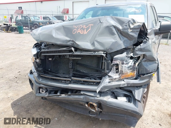 2018 Ford F-150 XL with VIN 1FTEW1EPXJFD25656, listed as a IAAI auction lot 42650683 with 119,326 mi miles and . Bid and sale history available at DreamBid. Image 6.