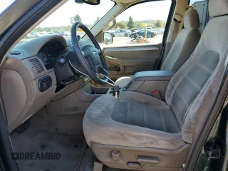 2004 Ford Explorer XLT with VIN 1FMZU63E24UB73616, listed as a Copart auction lot 76779474 with 165,864 mi miles and Clean title. Bid and sale history available at DreamBid. Image 7.