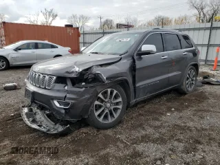 2017 Jeep Grand Cherokee Overland z VIN 1C4RJFCT0HC683423, wystawiony jako Copart lot #52234715 z przebiegiem 106 857 mil mil oraz Szkoda całkowita • Salvage title. Historia ofert i sprzedaży dostępna na DreamBid. Obrazek 1.