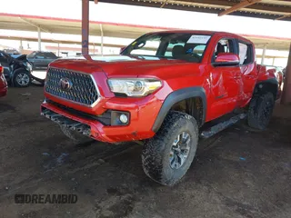2018 Toyota Tacoma SR with VIN 3TMCZ5AN8JM141486, listed as a IAAI auction lot 42142145 with 54,851 mi miles and . Bid and sale history available at DreamBid. Image 17.