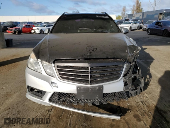 2011 Mercedes-Benz E 350 Luxury with VIN WDDHH8HB8BA351807, listed as a Copart auction lot 52191165 with 122,509 mi miles and Salvage Title. Bid and sale history available at DreamBid. Image 5.
