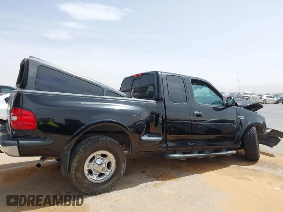 1999 Ford F-150 XL with VIN 1FTRX08L3XKB12260, listed as a IAAI auction lot 42244781 with Not provided miles and . Bid and sale history available at DreamBid. Image 12.