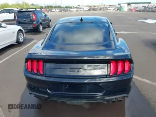 2021 Ford Mustang GT z VIN 1FA6P8CF1M5147740, wystawiony jako IAAI lot #38920487 z przebiegiem 15 299 mil mil oraz . Historia ofert i sprzedaży dostępna na DreamBid. Obrazek 16.
