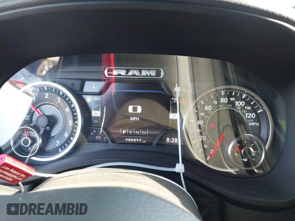 2021 Ram 1500 Big Horn with VIN 1C6SRFFT1MN520081, listed as a IAAI auction lot 42187257 with 186,011 mi miles and . Bid and sale history available at DreamBid. Image 7.