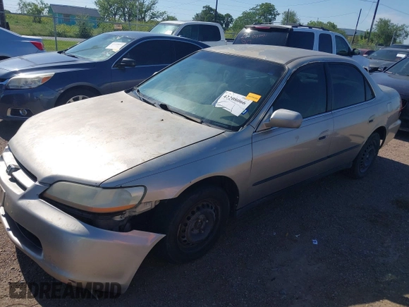 1998 Honda Accord LX with VIN 1HGCG5542WA266612, listed as a IAAI auction lot 42208066 with 202,101 mi miles and . Bid and sale history available at DreamBid. Image 2.