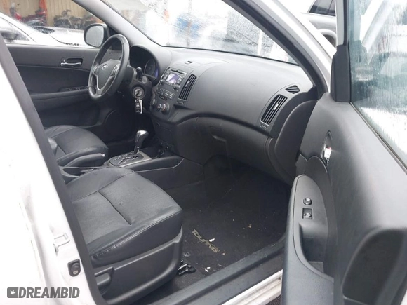 2012 Hyundai Elantra Touring SE with VIN KMHDC8AE2CU146880, listed as a IAAI auction lot 41705022 with 53,870 mi miles. Bid and sale history available at carsss.com. Image 5.