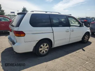 2002 Honda Odyssey EX with VIN 2HKRL18662H562178, listed as a Copart auction lot 63787995 with 256,072 mi miles and Salvage title. Bid and sale history available at DreamBid. Image 3.