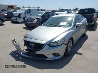 2017 Mazda Mazda6 Sport with VIN JM1GL1U50H1104088, listed as a IAAI auction lot 42000631 with 105,710 mi miles. Bid and sale history available at carsss.com. Image 2.