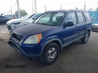 2004 Honda CR-V LX with VIN JHLRD684X4C023539, listed as a IAAI auction lot 42032809 with 186,056 mi miles and . Bid and sale history available at carsss.com. Image 17.