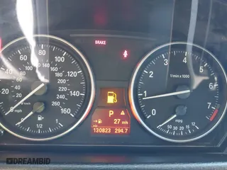 2015 BMW X1 xDrive28i with VIN WBAVL1C56FVY32753, listed as a IAAI auction lot 41759454 with 130,823 mi miles. Bid and sale history available at carsss.com. Image 7.