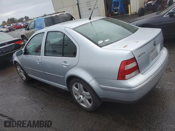 2004 Volkswagen Jetta GL z VIN 3VWRK69M54M030184, wystawiony jako Copart lot #77764124 z przebiegiem 97 634 mil mil oraz Szkoda całkowita • Salvage title. Historia ofert i sprzedaży dostępna na DreamBid. Obrazek 2.