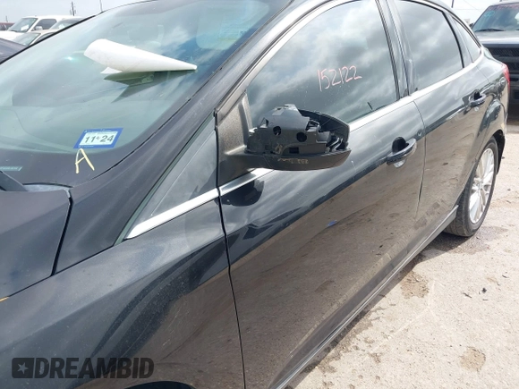 2013 Ford Focus Titanium with VIN 1FADP3J23DL152122, listed as a IAAI auction lot 41935180 with 175,065 mi miles and . Bid and sale history available at carsss.com. Image 13.