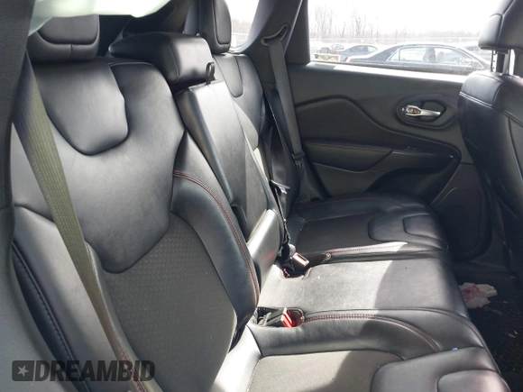 2021 Jeep Cherokee Trailhawk with VIN 1C4PJMBX4MD222987, listed as a IAAI auction lot 41771808 with 52,533 mi miles and . Bid and sale history available at DreamBid. Image 8.
