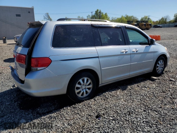 2010 Honda Odyssey EX-L with VIN 5FNRL3H76AB114542, listed as a Copart auction lot 54785425 with 104,239 mi miles and Salvage Title. Bid and sale history available at DreamBid. Image 3.