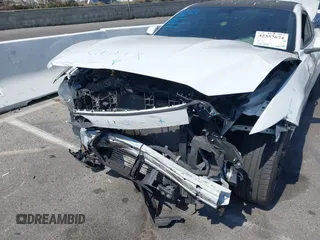 2015 Ford Mustang EcoBoost with VIN 1FA6P8TH4F5332918, listed as a IAAI auction lot 42357674 with 88,595 mi miles and . Bid and sale history available at DreamBid. Image 6.