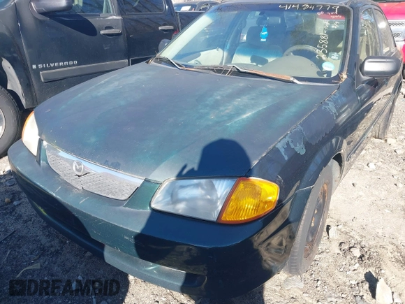 2000 Mazda Protege DX with VIN JM1BJ2229Y0235881, listed as a IAAI auction lot 41484779 with 283,054 mi miles and . Bid and sale history available at DreamBid. Image 6.