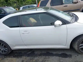 2014 Scion tC z VIN JTKJF5C77E3082073, wystawiony jako IAAI lot #42107615 z przebiegiem 223 895 mil mil oraz . Historia ofert i sprzedaży dostępna na DreamBid. Obrazek 13.