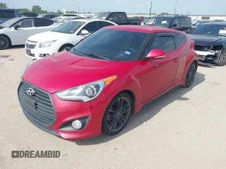 2016 Hyundai Veloster Turbo with VIN KMHTC6AE2GU284229, listed as a IAAI auction lot 42770574 with 103,784 mi miles and . Bid and sale history available at DreamBid. Image 2.