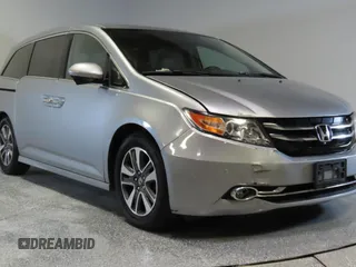 2016 Honda Odyssey Touring Elite с VIN 5FNRL5H98GB088791, выставлен на аукционе Copart как лот 59630465 с пробегом 88 100 миль миль и Списание • Salvage title. История ставок и продаж доступна на DreamBid. Изображение 1.